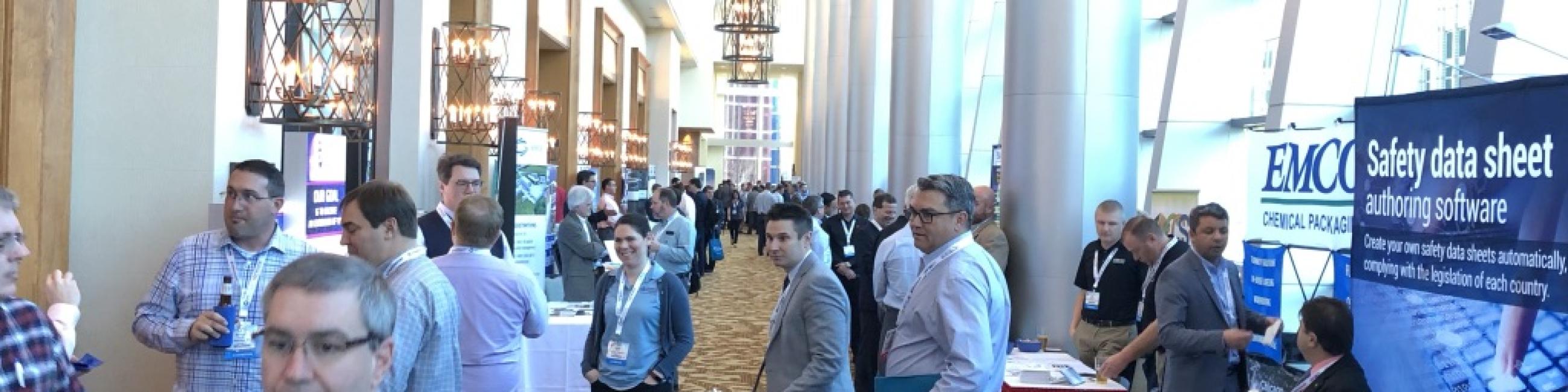 People navigating Texas 2019 conference hallway